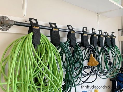 Easy garage organization tips to get things OFF the floor | Thrifty Decor Chick | Bloglovin’ Garage Wall Storage, Casa Garage, Garage Hooks, Garage Storage Inspiration, Garage Organization Tips, Doors Diy, Garage Update, Garage Organisation, Storage Shed Organization