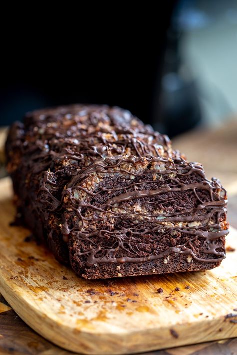 This Vegan German Chocolate Loaf Cake is a rich and moist chocolate cake baked in a loaf pan, with the traditional nutty pecan and coconut caramel filling running through the middle! Mole Cake, Chocolate Cake Images, German Chocolate Cookies, Chocolate Loaf, Chocolate Loaf Cake, Chocolate Muffin Recipe, Caramel Filling, Vegan Gluten Free Desserts, Vegan Richa