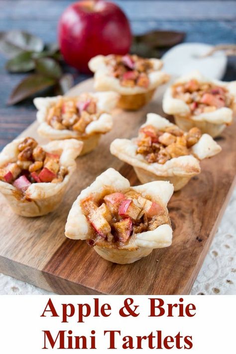 A cross between sweet and savory, these apple tartlets are wrapped in a flaky puff pastry and filled with apples, creamy brie and walnuts. #appletartlets #miniappletarts #appleandcheese #appetizer #snack via @littlesweetbaker Brie Tartlets, Apple And Brie, Apple Tartlets, Mini Tartlets, Apple Brie, Best Christmas Appetizers, Christmas Appetizers Easy, Tartlets Recipe, Puff Pastry Appetizers