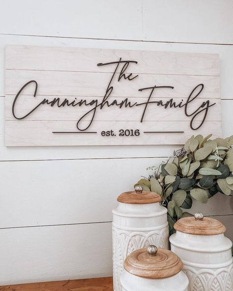 "Part of our line of unique family name signs, this sign features our signature modern calligraphy script that beautifully commemorates the establishment of a family.   Offered in your choice of 2 layouts, these unique one-of-kind signs make for an especially thoughtful wedding, engagement or  anniversary gift as well as a stunning entryway statement.  Couples are thrilled to use our signs as part of their custom wedding event decor that can later become part of their home decor and a treasured Family Name Sign Entryway, Farmhouse Family Name Signs, Last Name Welcome Sign Front Door, Last Name Wall Decor Living Room, Personalized Last Name Signs, Entryway Sign Ideas, Family Name Wall Decor, Custom Last Name Signs, Diy Family Signs Wood Wall Decor