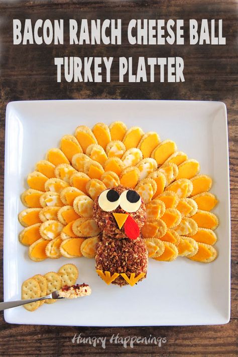 This Bacon Ranch Cheese Ball Turkey Platter is big enough to feed a hungry crowd on Thanksgiving. It's super cute too and will really make your table look festive and fun. Recipe at HungryHappenings.com. #cheeseball #thanksgiving #thanksgivingappetizers #cheese #turkeycheeseplatter Gluten Free Puff Pastry, Cheese Ball Turkey, Thanksgiving Appetizer Recipes, Bacon Ranch Cheese Ball, Turkey Platter, Ranch Cheese Ball, Turkey Cheese, Turkey Cheese Ball, Thanksgiving Snacks