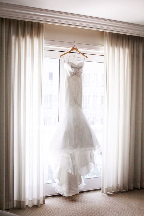 10 Wedding Dress Shots You Didn't Know You Needed Hanging Wedding Dress, Wedding Dress Hanging, Wedding Shot List, Wedding Dress Photography, Brides Dress, Wedding Dress Hanger, Wedding Details Photography, Hanging Ideas, Wedding Picture Poses