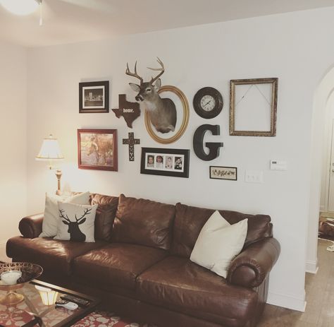 Eclectic wall decor using deer head. #deerhead #funwall #texas Deer Head Collage Wall, Deer Mount Ideas Decor Living Rooms, Deer Mount Wall Arrangement, Deer Heads Living Room, Deer Bedroom, Deer Living Room, Living Room Men, Deer Head Decor, Deer Head Wall Decor