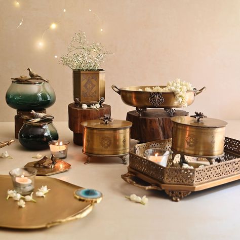 Make your Diwali even more special with the timeless charm of brass. Celebrate the festival of lights in style, surrounded by the glow of tradition and elegance. ✨🪔 ⁠ Brass Round Ornamental Box: Rs 5850⁠ Brass Square Ornamental Box: Rs 5850⁠ ⁠Brass Fruit Bowl: Rs 4850 Green Glass Jar Set: Rs 6480 Dry Fruit Box, Fruit Holder, Garden Lover Gifts, Entertaining Gifts, Father Christmas Gifts, Fruit Box, Artificial Flowers And Plants, Mirror Tray, Champagne Buckets