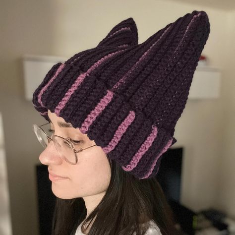 Side view! I love a dramatic chunky hat. 🧶 You can make one with my Y0uTube tutorial or get the PDF in my sh0ps! 🧶 🧶 🧶 #crochet #slowfashion #chowderhat #handmadehat #handmade #crafts #textileart #handmadeisbetter #crochethat #chowder #chowderfanart #cathat #crochetcathat #crochetersofinstagram Crochet Cat Beanie, Crochet Cat Hat, Purple Crochet, Chunky Hat, Cat Beanie, Cat Hat, Handmade Hat, I Love A, Crochet Cat