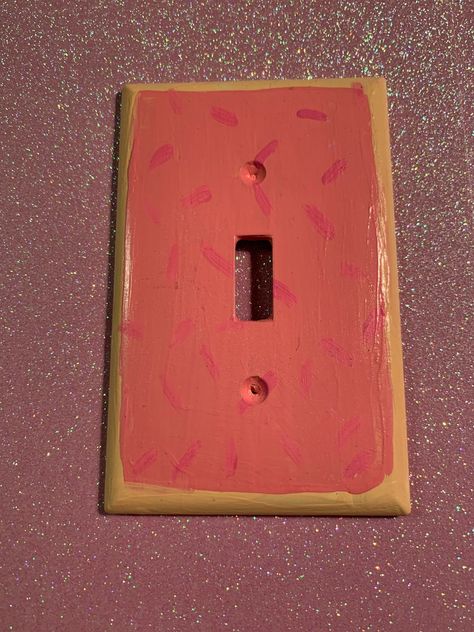 Standard size single light switch cover. This beautiful cover is decorated to look like a Strawberry POPTART. So beautifully designed, please don’t try to eat it! ☺️ Each plate is hand painted by the shop's artist, Courtney! ;-) We are in the process of increasing inventory with dou Paint Light Switch Covers, Cute Ways To Paint Your Light Switch, Light Switch Covers Paint, Outlet Cover Painting Ideas, Outlet Painting Ideas, Hand Painted Switch Plate Covers, Outlet Covers Painting, Strawberry Light Switch Cover, Wall Outlet Covers