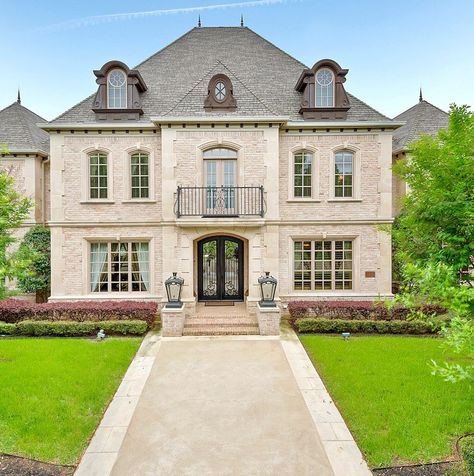 beautiful entrance with double doors, cast or limestone surround, iron balcony French Chateau Inspired Homes, French Chateau Floor Plans, French Chateau Exterior, Chateau Exterior, French Chateau Style Homes, New Orleans Style Homes, Colleyville Texas, House Themes, Brick Homes