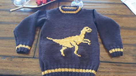 Ravelry: Dinosaur Sweater and Hat (Velociraptor) by Denny Gould Dinosaur Jumper, Baby Jumpers, Dinosaur Sweater, Knitting Patterns Boys, Kids Knitting Patterns, Animal Sweater, Hat Knitting Pattern, Jumper Knitting Pattern, Girl Dinosaur