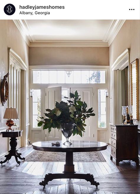 Foyer With Table In Middle, Round Table Hallway, Large Front Entry Room Ideas, Foyer With Round Table, Grand Foyer Ideas Entryway, Round Entrance Table, Round Foyer Table Decor, Grand Entryway Foyers, French Classic Interior