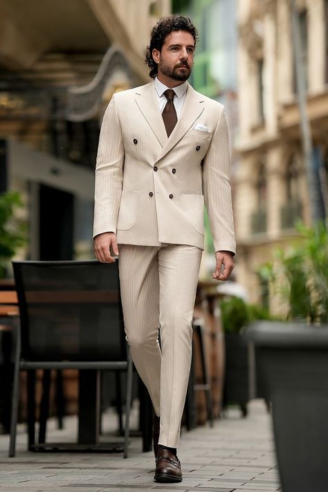 Reimagine classic tailoring with this elegant beige striped double-breasted suit. The tailored fit, combined with contemporary stripes, makes it an ideal choice for those who want to make a statement without compromising on sophistication.  #beigesuit #stripedtailoring #modernfashion #elegantstyle #tailoredlook #professionalwear #chicensemble #sophisticatedstyle #fashionforward #stylishsuit Bow Tie Suit, Modern Fit Suit, Suit Styles, Suit Stores, Slim Fit Suit Men, Classic Tailoring, Seersucker Suit, Beige Suits, Stylish Suit