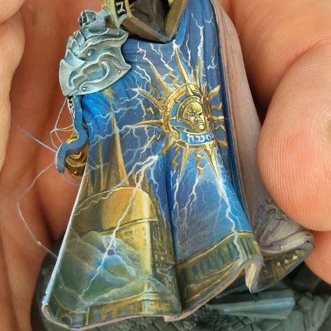 Alessandro Gobbi on Instagram: "Wip BASTIAN CARTHALOS! ⚡⚡⚡ Freehand in progress... #wip #bastiancarthalos #aos #miniature #miniaturepainting #gw #skin #face #osl #lightning #steel #gamesworkshop #warhammer #armour #ageofsigmar #stormcast #nmm #gold #lifecolor #alessandrogobbi #coderevenge #painting #paintingwarhammer #warhammercommunity #freehand" Bastian Carthalos, Warhammer Miniatures Painting, Warhammer Freehand, Warhammer Bases, Stormcast Eternals Paint Scheme, Stormcast Eternals, Age Of Sigmar, Life Drawing Reference, Dungeons And Dragons Miniatures