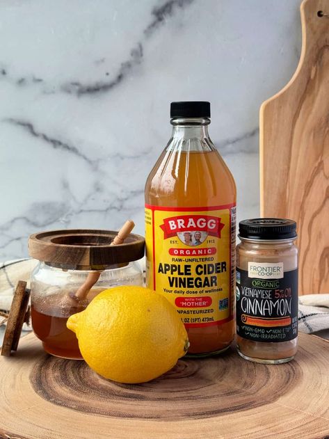 This hot apple cider vinegar detox drink is robust and comforting. Made with apple cider vinegar, lemon, honey and cinnamon for a flavorful warm tea. Skip the chill with a spicy-sweet ACV tea! #applecidervinegardrink #hotapplecidervinegartea #acvtea #acvdrink Apple Cider Vinegar Tea Sore Throat, Detox Apple Cider Vinegar Drinks, Hot Apple Cider Vinegar Drink, Apple Cider Vinegar Lemon Honey Cinnamon, Acv Lemon Honey Cinnamon, Apple Cider Vinegar Benefits Drinking, Acv Tea, Acv Benefits, Apple Cider Vinager