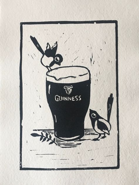 "Handprinted original linocut relief print, limited edition of 150. This print has been handcrafted by carving my design into a lino plate, then using oil based relief print ink I have printed it by hand onto handmade khadi cotton rag paper (150gsm) with a deckled edge. The print features a pint of Guinness and two magpies. Two magpies signify \"Two for Joy\", the reason you'll always see an Irish person salute a lone magpie! This print would make a lovely gift for a Guinness or magpie lover. Each print will vary slightly in size and finish as it is handmade. I use recycled materials wherever possible so excuse the backings, which are to protect the print from bending in transit. Sold unframed but is roughly A5 if you are looking for a frame to fit it. Items will be posted using An Post" Wood Cut Printmaking, Cool Lino Prints, Guinness Tattoo, Linocut Bookmark, Linocut Prints Ideas Simple, Guinness Art, Lino Print Designs, Lino Cut Art, Two Magpies