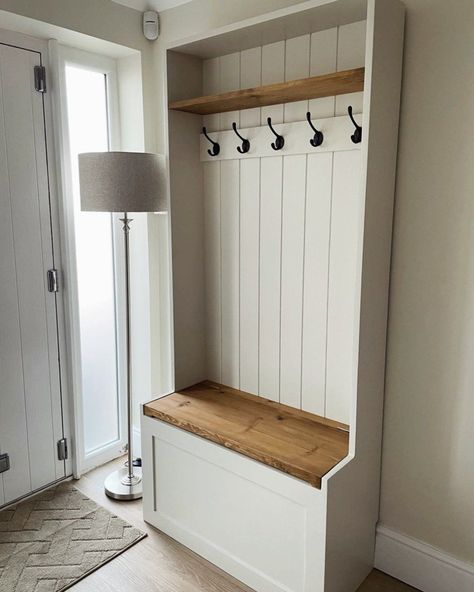 Our handmade and freestanding Hallway bench provides a 'soft close' lift up bench seat with hidden shoe storage beneath, a high shelf and multiple hooks for coats and bags. Perfect for everyone to put on and take off their shoes easily whilst banishing those annoying shoe piles left by the door. Pictured above in Farrow and Ball 'School House White' our hallway bench is handcrafted to keep any hallway, entryway or utility room tidy and clutter fr Shoe Rack And Coat Rack, Coat And Shoe Racks, Hallway Shoes And Coat Storage, Small Porch Coat And Shoe Storage, Porch Shoe And Coat Storage, Front Door Shoe And Bag Storage, Hall Storage For Coats And Shoes, Modern Country Hallway, Small Coat Storage Ideas