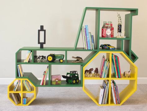 Fun, Clever, and Unique Bookshelves | Book Riot Tractor Bedroom, Tractor Room, Tractor Decor, Farm Room, Unique Bookshelves, Toddler Boy Room Decor, Cool Bookshelves, Nursery Shelves, Toddler Boys Room