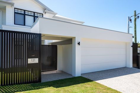 Rendered Modern Double Carport and Gate - Scally Projects | Patios Gold Coast, Carports and Decks Carport With Fence, Modern Double Garage, Flat Roof Carport, Sloped Driveway, Garage Fence, Modern Carport, Side Gate, Double Carport, Modern Fence Design