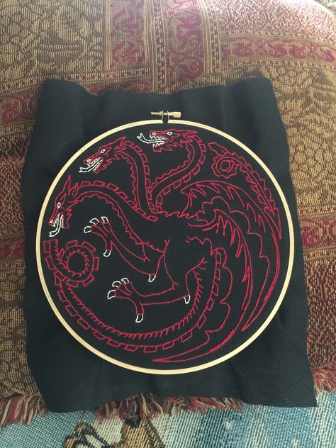 House Targaryen Sigil Embroidery #GoT #dragon #targaryen  Excuse the excess fabric. House Of The Dragon Crochet, Got Embroidery, House Of The Dragon Embroidery, Targaryen Embroidery, Dnd Embroidery, Dragon Embroidery Pattern, House Targaryen Sigil, Got Dragon, Targaryen Sigil