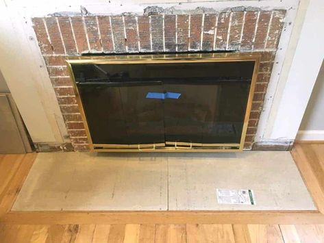 Updating fireplace Hearth Floor Level Fireplace Hearth, Fireplace Hearth Ideas, Fireplace Hearth Stone, Airstone Fireplace, Pellet Fireplace, Hearth Pad, Hearth Tiles, Hearth Stone, Fireplace Redo