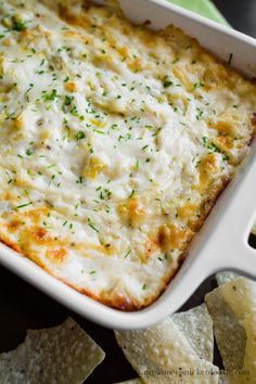 The BEST cheesy artichoke dip EVER!!! It's made with three cheese and served hot. | mynameissnickerdoodle.com Hot Artichoke Dip Recipe, Artichoke Parmesan Dip, Hot Artichoke Dip, Parmesan Dip, Dip Recipes Hot, Awesome Appetizers, Artichoke Dip Recipe, Three Cheese, Buffalo Chicken Dip