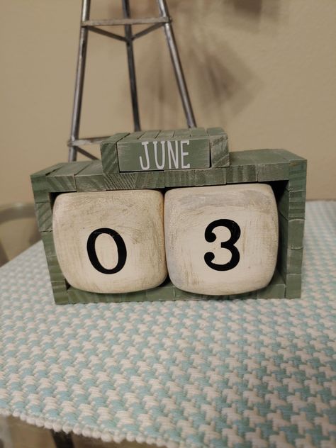 Dollar Tree Block Calendar.  I used the Dollar tree jenga game blocks and a bag of the Dollar Tree large toy foam dice. Glued the frame from the blocks and painted the dice. The Frugal Crafter, Dollar Tree Gifts, Block Calendar, Jenga Game, Jenga Blocks, Crafts For Teens To Make, Holiday Crafts Diy, Dollar Store Hacks, Diy Dollar Tree Decor