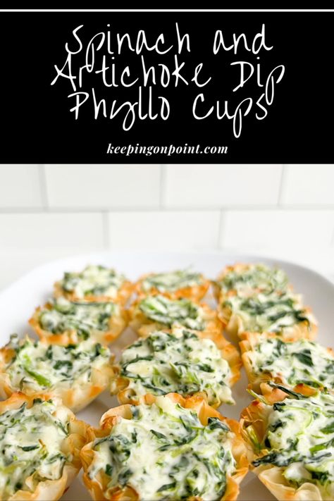 Say 'Hello' to a new obsession! These Spinach and Artichoke Dip Phyllo Cups are perfect for any party or family gathering. Not only are they super easy to make, but they also disappear quicker than you can say 'yum'. Save this recipe, pin it, and let the deliciousness begin. Artichoke Phyllo Cups, Keeping On Point, Creamy Spinach Dip, Impressive Appetizers, Phyllo Cups, Spinach And Artichoke Dip, Phyllo Dough, Creamy Spinach, Spinach Dip