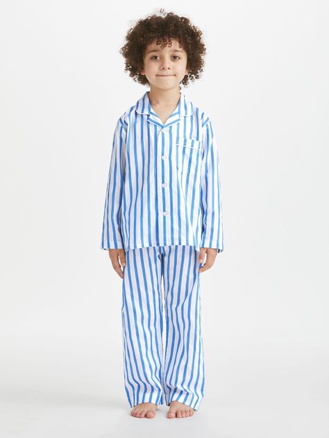 Crafted to keep them looking their best, whether it be for winding down before bed or for breakfast around the table in the morning - we've kept things simple for our kids' pyjamas, with a smart, rounded collar with revers, one breast pocket and plain hems on the sleeves. The pyjama top is fastened with buttons and piped in complementary white, while the trousers have an elasticated waist for ease and comfort. Featuring a summery blue and white stripe print. Made from a mid-weight 100% pure cott Boy In Striped Pyjamas, Striped Pajamas, Summer Safety, Kids Pyjamas, Derek Rose, Striped Pyjamas, Before Bed, Kids Pajamas, Pajama Top