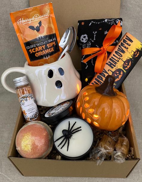 Get ready to be spooked and surprised with our three exclusive Halloween Gift Boxes, packed with thrilling treats and eerie goodies!  These boxes are full of Halloween magic and will make this spooky season one to remember.  ️ 🎃 Limited Availability: Don't miss out on this spooktacular offer! The Halloween Gift Boxes are available in limited quantities. Grab yours now before they vanish into the shadows. Ghost Spa Box: 🎃 12oz White Ghost Mug - faces vary per box 🎃 Shovel Spoon 🎃 Cozy Halloween Socks - Mixed Selection is picked for your box 🎃 Scented Candle - handmade in our shop 🎃 Orange Lighted Ceramic Pumpkin  🎃 Citrus Bath Salts 🎃 Gourmet Happy Halloween Chocolate Bar 🎃 Apple Harvest Scented Bath Bomb 🎃 Beverage Selection: Hot Cocoa, Coffee, Pumpkin Coffee, Cider, Chai Tea, Ch Gift Box For Best Friend, Fall Care Package, Ivory Throw Blanket, Spooky Halloween Gifts, Boo Gift, Halloween Themed Gifts, Halloween Gift Baskets, Traverse City Mi, Large Gift Boxes