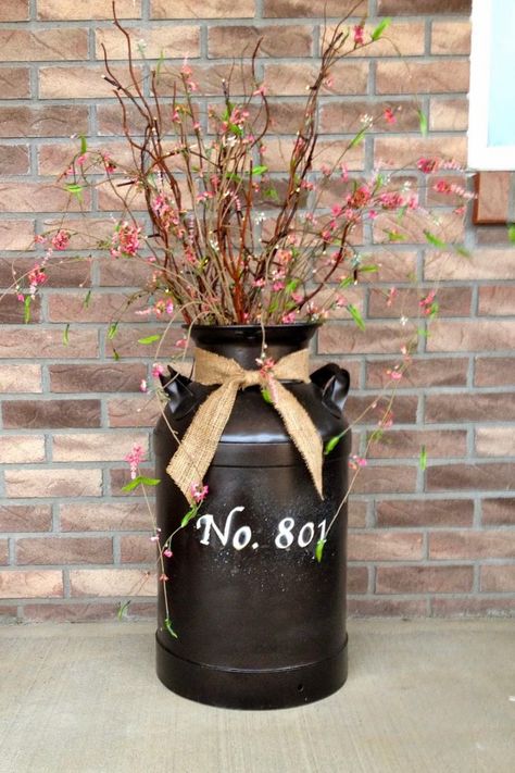 Milk Can Garden Ideas, Milk Can Table, Milk Can Decor, Rustic Front Porch, Porch Inspiration, Bronze Spray Paint, Old Milk Cans, Vintage Milk Can, Lighted Branches