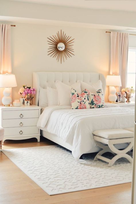 Drew Barrymore Walmart Flower Home Collection. master bedroom makeover, white tufted bed, white and gold lamps, white with brass nightstand, floral pillows, white bed, white bedroom Soft Feminine Bedroom, Bedroom Design Pink, White Tufted Bed, Bedroom Chaise, Pink And White Bedroom, Feminine Bedroom Design, Teen Girl Bedroom Decor, Brass Nightstand, Gold Lamps