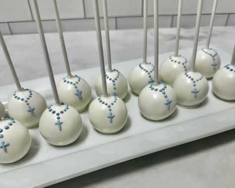 Baptism cake pops. Bite sized celebrations 🕊️  #baptismcakepops #kupcakekitchen #wantcake #designercakepops #cakepopart #cakepopmaker #cakepoplove #cakepopartist #customcakepops #customizedcakepops #baptismcakepops #baptismdesserts #baptismgift #baptismgifts #baptismparty #christeningparty #christeningday #christeninggift #christeninggifts #christeninginspo #santaclarita #santaclaritavalley Baptism Cake Pops, Baptism Desserts, Custom Cake Pops, Confirmation Party, Cake Pop Maker, Christening Party, Baby Boy Baptism, Baptism Cake, Baptism Party