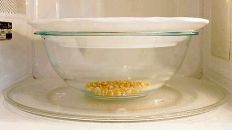 Microwave Popcorn  Glass bowl, ceramic plate, popcorn kernels = perfectly popped popcorn in the microwave. No bag, butter or oil. Even no un-popped kernels.  Take 1/4 cup of dry popcorn kernels and place in the bottom of a microwave-safe glass bowl (pyrex is a great choice). Place a microwave-safe plate on top of the bowl. Plate should be wide enough to go beyond the rim of the bowl. Microwave for 2 minutes 45 seconds. Watch in glory as your popcorn pops perfectly into little puffs of heaven. Diy Microwave Popcorn, Homemade Microwave Popcorn, Perfect Popcorn, Homemade Popcorn, Microwave Popcorn, Pop Popcorn, Microwave Recipes, Think Food, Comfort Foods