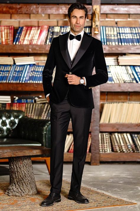 Dive into the depths of sophistication with our Black Velvet Slim-Fit Tuxedo 3-Piece ensemble. As you embark on a journey draped in luxurious velvet, prepare to command attention and captivate hearts with every stride. #suits #suit #slimfit #tuxedo #velvettuxedo #blacktuxedo #formallook #formalwear #mensstyle #menfashion Mens Velvet Blazer Outfit Wedding, Black Velvet Suit Mens, Black Velvet Blazer Men, Velvet Wedding Suit, Prom Male, Black Velvet Tuxedo, Groom Suit Black, Blazer Waistcoat, Male Suit