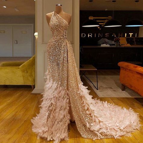 Lilian is a very powerful werewolf who has yet to unlock all her powe… #romance #Romance #amreading #books #wattpad Feather Prom Dress, Gold Evening Dresses, One Shoulder Prom Dress, African Prom Dresses, Gold Prom Dresses, Evening Party Gowns, فستان سهرة, Pink Prom Dresses, Dresses 2020