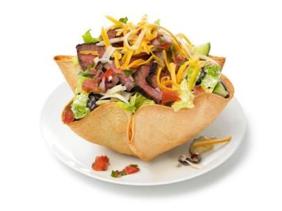 Almost-Famous Steak Taco Salad Steak Taco Salad, Steak Taco, Edible Bowl, Tortilla Bowls, Taco Salad Recipe, Taco Salad Recipes, Steak Tacos, Enjoy Your Meal, Food Network Magazine