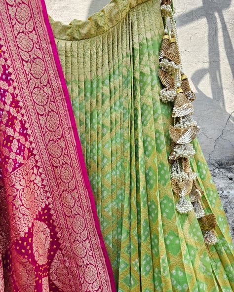 ***SOLD***INR 36500 Pure Banarsi Georgette bandhani lehenga. This three-piece set consists of a stitched lehenga, an unstitched blouse piece, and a beautiful Banarsi georgette bandhani dupatta. Lehenga Length: Approx 44 inch length Lehenga Waist: Approx 34 waist with drawstrings and zip closure on the side. Lehenga/ Ghagra has a single layer of Cancan and a double layer of lining. Lehenga Fabric: Pure Banarsi Georgette Blouse Fabric: Pure Banarsi Georgette Dupatta Fabric: Pure Banarsi Georg... Bandhani Lehenga, Georgette Blouse, Blouse Fabric, Blouse Piece, Double Layer, Lehenga, Baby Shower, Pure Products, Fabric