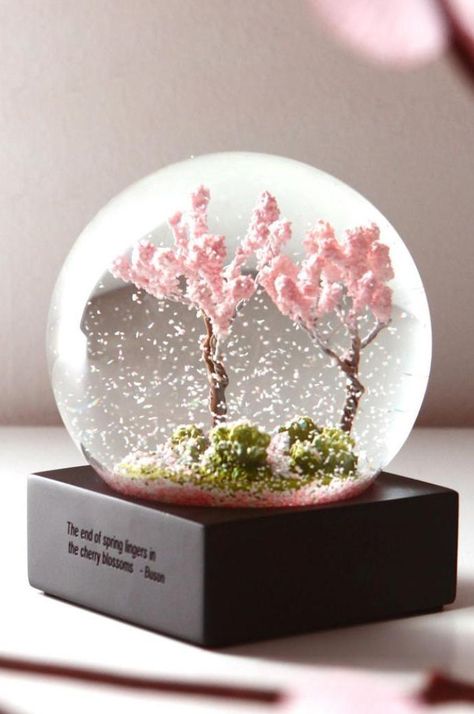 The end of spring lingers in the cherry blossoms End Of Spring, Water Globes, Crystal Figurines, Cute Room Decor, Snow Globe, Cherry Blossoms, Music Box, Crystal Ball, Resin Art