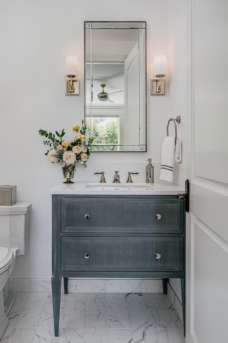 We love brightening up small bathrooms is with fresh florals and a few subtle touches of light grey for a chic, clean feel. From our #SandyLane project. Photo by @christopherstark #julierootesinteriors⁠ Mill Valley, California • #bathroom #powderroom #powderroomdesign #powderroomdecor #bathroomdecor #bathroominspo #bathroomvanity #bathroomsink #greybathroom #marblefloors #marbleflooring #luxurybathroom #luxuryhomes #luxuryinteriordesign #millvalley Sink Vanity Ideas, California Bathroom, Mill Valley California, Girl Bathroom, Chic Bathroom, Powder Room Decor, Powder Room Design, Vanity Ideas, Jack And Jill Bathroom