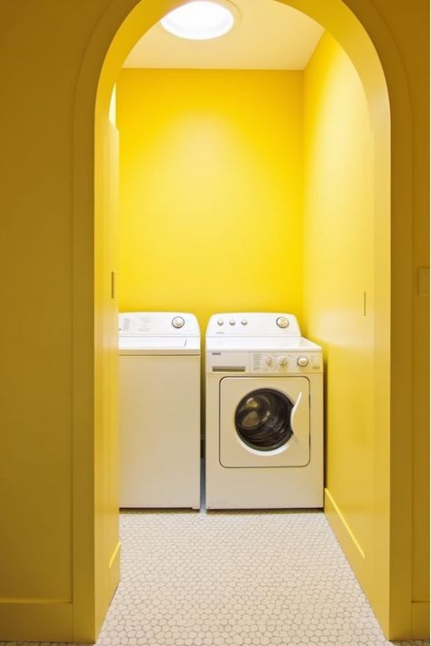 Bright yellow laundry room with white appliances and patterned floor Colourful Laundry, Yellow Laundry Room, Yellow Laundry, Yellow Laundry Rooms, Laundry Room Colors, Laundry Space, Yellow Decor, Boost Your Mood, Yellow Walls