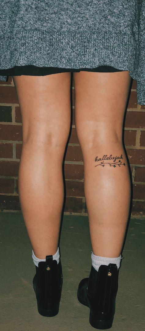 hallelujah tattoo and flower and vine Word Vine Tattoo, Vines And Words Tattoo, Christian Knee Tattoo, Bible Vine Tattoo, Back Of Knee Tattoo Women, Flower And Word Tattoo, Abide Tattoos Vine, Word Tattoos Above Knee, He Turns Graves Into Gardens Tattoo