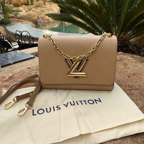 This Is A Stunning Combo ! Hard To Get This Beige And Black Authentic Louis Vuitton Twist Mm Bag Comes With The Original Leather Strap As Well As The Sleeper It Has Been Used Once It Is Literally Brand New Please Review All Photos I Will Not Do Any Holds Or Trades This One Will Go Fast! It’s A Perfect Bag To Use As A Date Night Or You Can Throw The Long Shoulder Strap On And Use It As A Crossbody This Bag Will Go Always With Everything. The Lv Twist Is Done In A Beautiful Gold. Light Scratch S Twist Mm Louis Vuitton, Gold Epsom Leather Bag For Everyday Luxury, Louis Vuitton Handbags Speedy, Real Louis Vuitton, Lv Twist, Louis Vuitton Mm, The Sleeper, High Fashion Outfits, Gold Bag