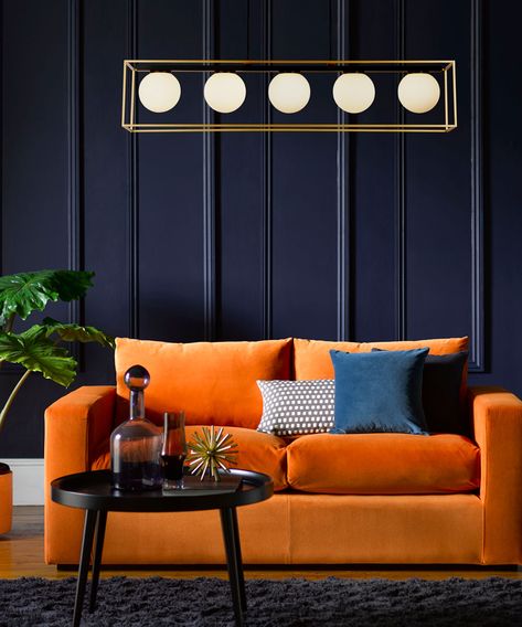 Our blue living room ideas are some of our favourites, simply since blue is such a versatile hue to work with. From navy to turquoise, here's how to use it Orange Couch, Wall Color Combination, Orange Sofa, Living Room Orange, Orange Decor, Living Room Trends, Blue Living Room, Wall Color, Room Sofa