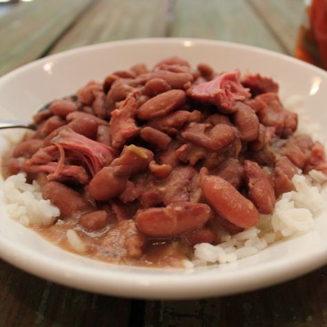 Red beans and rice is another recipe that can be made in advance and kept warm on the stove - your guests can serve themselves! Emeril Recipes, Red Beans And Rice Recipe, Red Beans N Rice Recipe, Red Beans And Rice, Emeril Lagasse, Cajun Cooking, Beans And Rice, American Recipes, Cooking White Rice