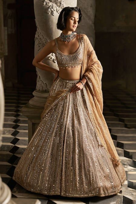 Buy Gold Net Embroidered Mirror Round Bridal Lehenga Set For Women by Seema Gujral Online at Aza Fashions. Lehenga Shoot, Tuscan Summer, Golden Lehenga, Sequin Lehenga, Peach Lehenga, Seema Gujral, Gold Lehenga, Mirror Work Lehenga, Work Lehenga