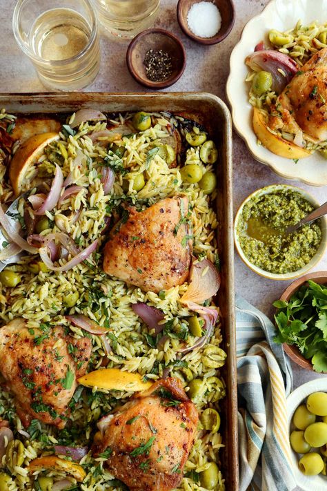 Sheet Pan Chicken with Lemon, Olives and Pesto Orzo Chicken Marinade Yogurt, Bourbon Banana Pudding, Greek Yogurt Chicken Marinade, Irish Colcannon, Pesto Orzo, Chicken With Lemon, Lemon Pesto, Pudding Cheesecake, How To Cook Orzo