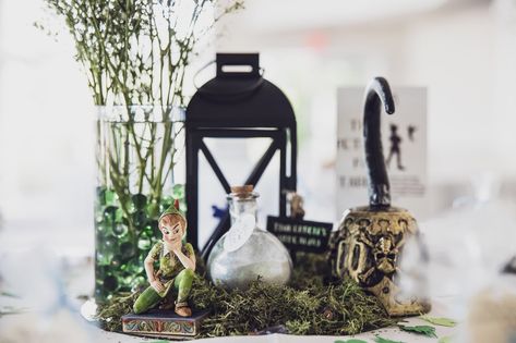 Neverland Centerpiece Ideas, Peter Pan Centerpieces, Disney Decorations Party Ideas, Peter Pan Wedding Theme, Peter Pan Themed Wedding, Peter Pan Centerpiece Ideas, Prom Centerpieces, Neverland Wedding, Pirate Wedding Theme