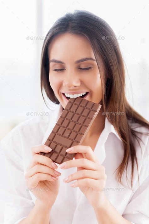 Eating Chocolate Photography Woman, Woman Eating Chocolate, Eating Chocolate, Smiling Woman, Woman In White, Banner Background Images, Person Sitting, Banner Background, Eyes Closed