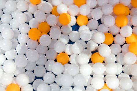 Ping pong balls mix of orange and white balls on a blue table background Table Background, Ping Pong Balls, Blue Table, Holiday Activities, Ping Pong, Easter Eggs, Orange, White