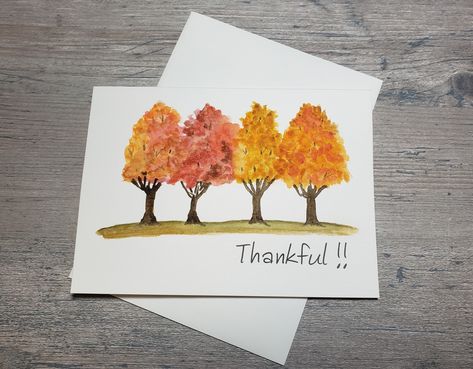 The Autumn "Thankful" Greeting Card is a hand painted watercolor painting. The artwork was done on Strathmore Watercolor 140# Cold Press Off-White Paper.  (Hand painted by me). The card comes with an envelope, and the inside of the card is blank so you can add a specialized message/greeting. The card measures approximately 5" x 7".   Please note that some computer monitors display colors differently from others. I have enclosed the card in an archival safe, acid free clear bag for protection. Watercolor Thanksgiving Cards Ideas, Thanksgiving Watercolor Ideas, Watercolor Thanksgiving Cards, Thanksgiving Watercolor Cards, Fall Card Ideas, Fall Watercolor Paintings, Thanksgiving Watercolor, Ar Art, Thankful Thanksgiving