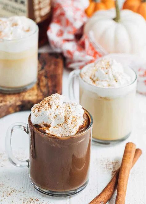 This easy-to-make Pumpkin Spice Hot Chocolate is the perfect recipe for a chilly fall day. Made with real pumpkin puree and your choice of dark or white chocolate, this homemade hot chocolate is a decadent fall treat. Top it with brown sugar whipped cream (and an optional splash of bourbon for the adults)! #pumpkinspice #hotchocolate What Is Pumpkin Spice, Homemade Pumpkin Spice Coffee Creamer, Homemade Pumpkin Spice Creamer, Fall Hot Chocolate, Pumpkin Spice Hot Chocolate, Best Coffee Creamer, Homemade Pumpkin Spice Coffee, Pumpkin Spice Coffee Creamer, Spice Hot Chocolate