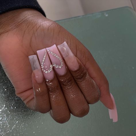 Heart With Rhinestones Nails, Heart Crystal Nails, Heart Rhinestone Nails Bling, Heart Nails With Rhinestones, Clear Pink Nails With Rhinestones, Acrylic Nails With Heart Rhinestones, Pink Acrylic With Rhinestones, Pink Nails With Gemstones, Pink French Tip Nails With Gems